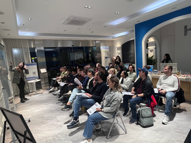 The foreign residents are having their first class.