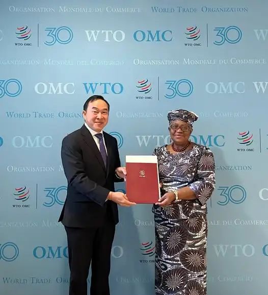 可能是包含下列内容的图片:2 位用户和上面的文字是“ORGANISATION MONDIALE DU COMMERCE WTO OMC WORLD TRADE ORGANIZATION 30 WTO OMC GANIZACION MUNDIAL DEL COMERCIO WTO DMC W 30 ORGANISATION MONDIALE DU COMMERCE O OMC WTO WIO OMC WORLD TRADE ORGANI 30 OMC w OMC ORGANISATION ORGANIZACIÓN DEI COMERCIO WTCAMC WTC M WTO OMC GANIZATION WIO OMC 30 ANIZACION MUNT ORGAI 30 O OMO ALEDUCOMMERO ALE DU COMMERC WORLD TRADE ORO WTO ORGANI COMERCIO”