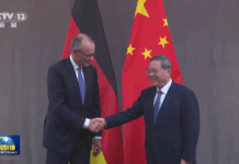 李强会见德国总理