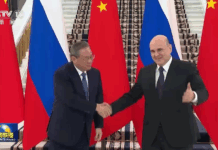 李强会见俄罗斯总理