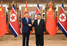 习近平同金正恩举行会谈