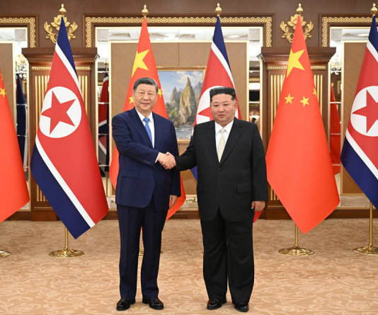 习近平同金正恩举行会谈