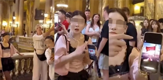 中国游客巴黎歌剧院拍照起冲突,聋哑女子亮五星旗引争议后道歉