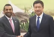 中国公安部部长王小洪会见美国联邦调查局局长帕特尔