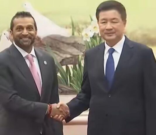 中国公安部部长王小洪会见美国联邦调查局局长帕特尔