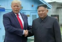 特朗普晒与金正恩合影 强调关系融洽
