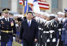 美将高规格大规模迎接习近平 美军479人参与含B-2与F-22飞行表演