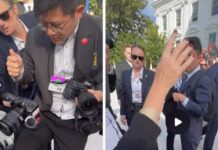 习近平抵达白宫前 中美记者争抢拍摄位置发生推挤
